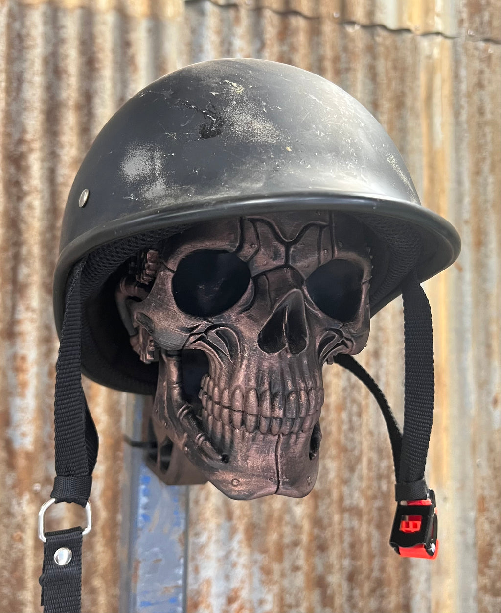 3D printed steampunk skull helmet stand with copper finish, front view